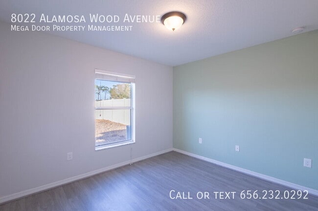 Building Photo - 8022 Alamosa Wood Ave