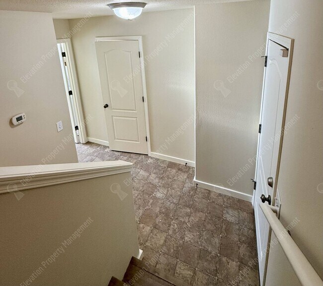 Building Photo - Updated 3 BR/2.5  BA with new flooring and paint!