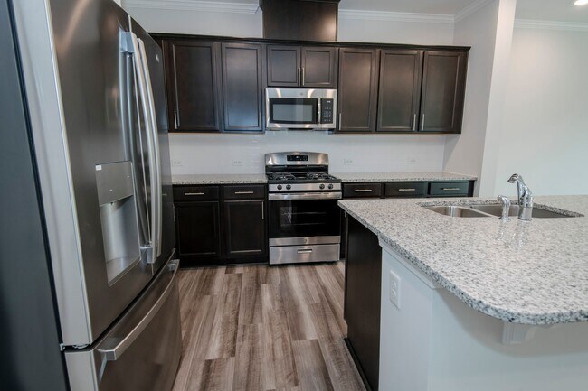 Building Photo - Beautiful 3 Bedroom 2.5 Bathroom Townhome Located in Downton Square, Holly Springs! Available Jul...
