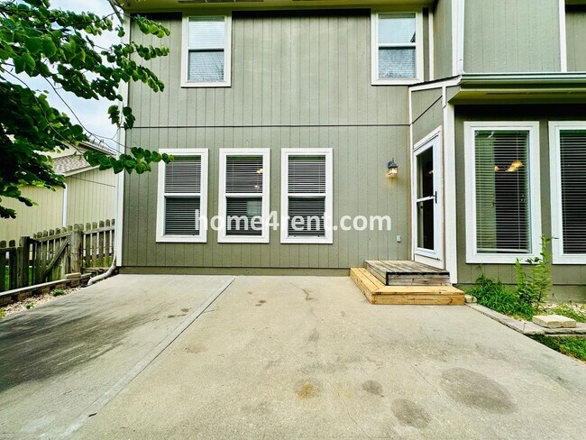 Building Photo - Beautiful Four-Bedroom Home with Three Car Garage, Wood Floors, Finished Basement and a Fenced Ya...