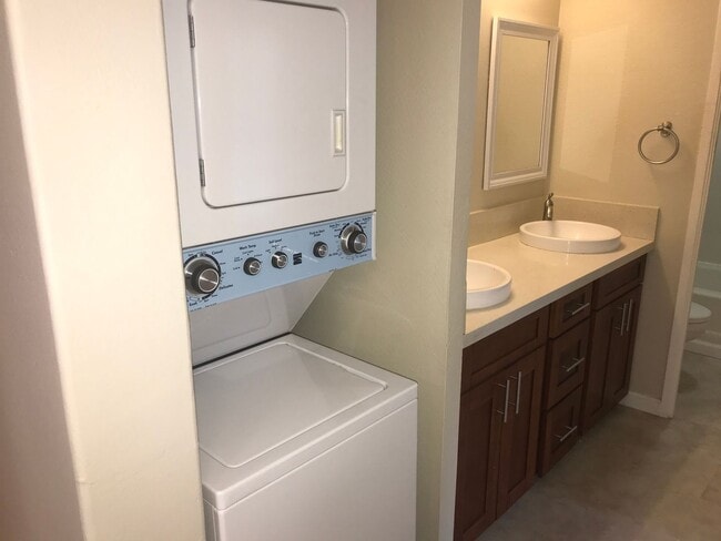 Building Photo - Pearl II - Ground Floor Unit, with large lanai, covered/secured parking, washer/dryer in unit, te...