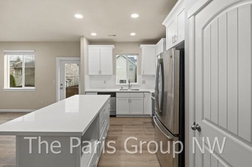 Building Photo - Gorgeous Updated 2012 Covington 4BR – New Paint, Floors, Cabinets, Quartz Counters +++