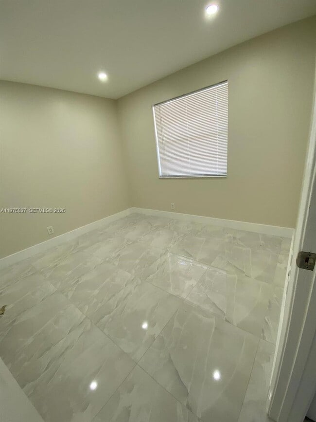 Building Photo - 8830 Royal Palm Blvd