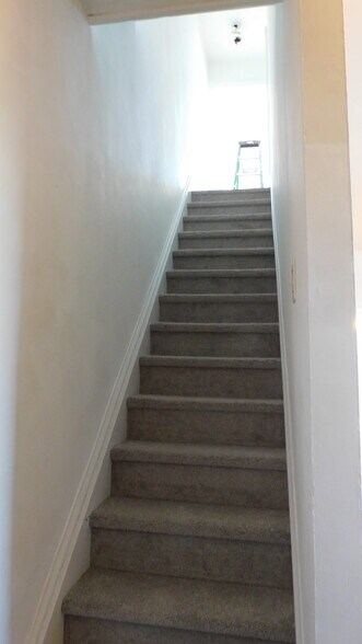 Going upstairs - 1225 W Walnut St