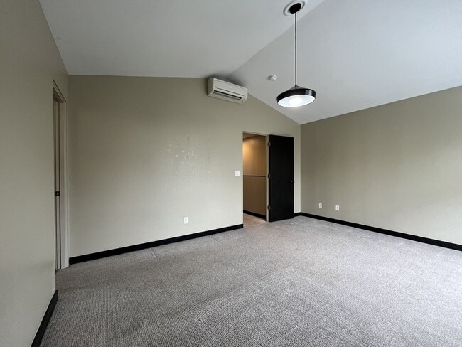 Building Photo - Charming 3 Bedroom, 2.5 Bathroom Home with Large Living Room, Tall Windows, Island Kitchen, and A...