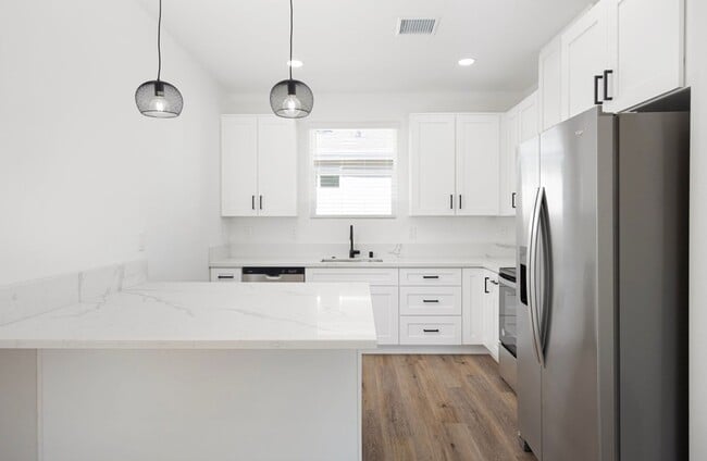 Building Photo - 1/2 Off First Month's Rent - New Construct...