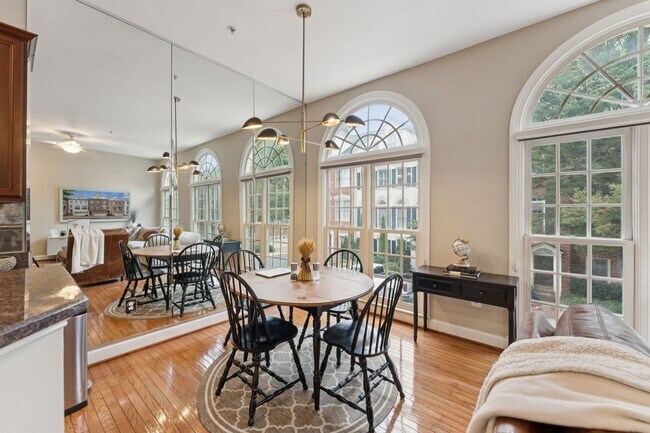 Building Photo - Discover this stunning four-level townhous...