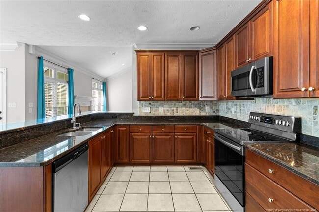 Building Photo - 480 Whispering Pines Dr