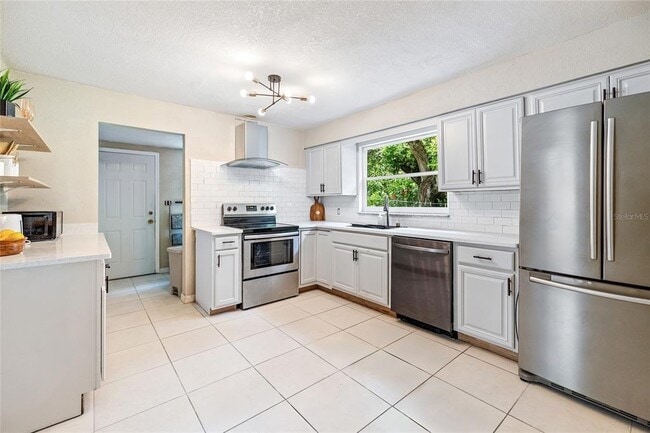 Building Photo - 3607 E 24th Ave