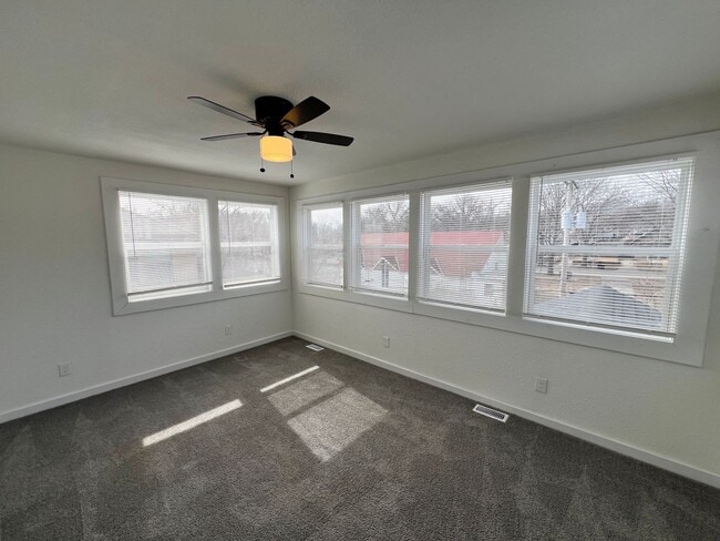 Building Photo - Updated 5BR Home with Modern Finishes & Extra Space