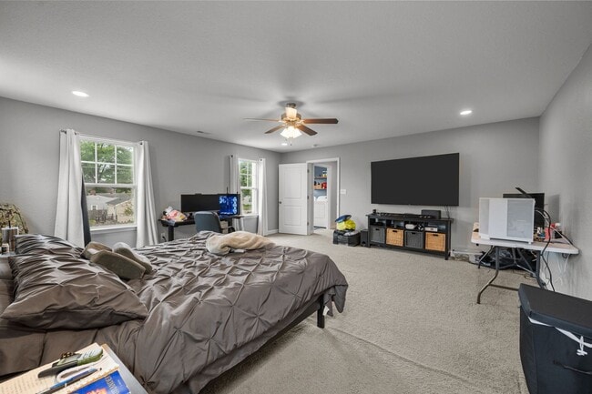 Building Photo - Spacious 6-Bedroom Home with Private Backy...