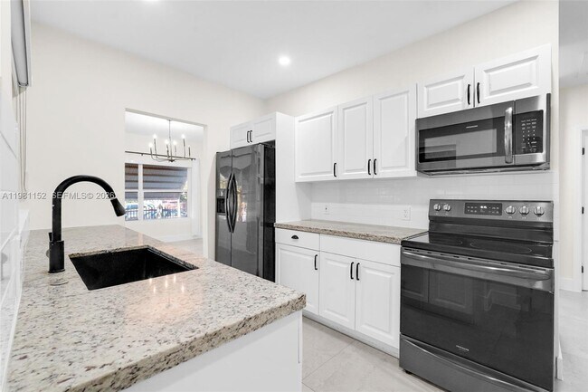 Building Photo - 52 NW 47th Terrace