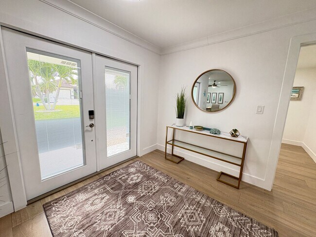 Building Photo - Beautifully Furnished Pool Home with Boat ...