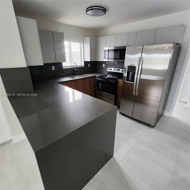 Building Photo - 1171 NW 66th St