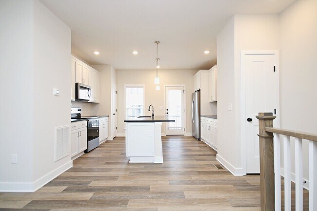 Building Photo - Dog-Friendly Old Trail Townhome - Walk To Local Shops, Restaurants, & More!