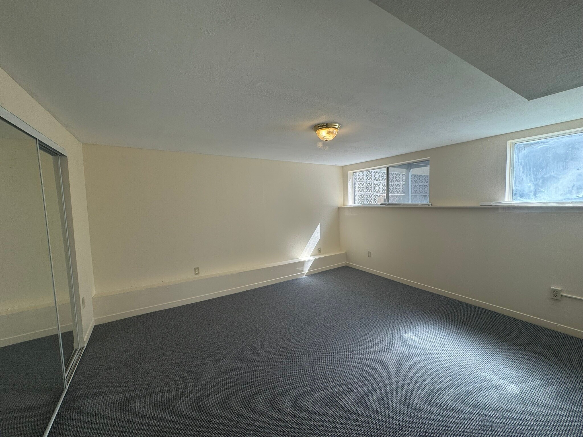 Downstairs Bedroom with Full Size Closet - 1606 39th Ave