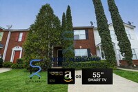 Building Photo - Move in before February 15th and choose your reward: a $250 Amazon Gift Card or a 55" Smart TV!