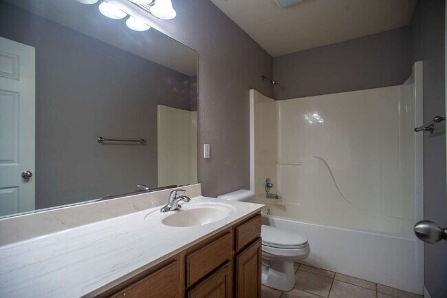 Building Photo - "Spacious 4-Bed Home with Granite Touch & ...
