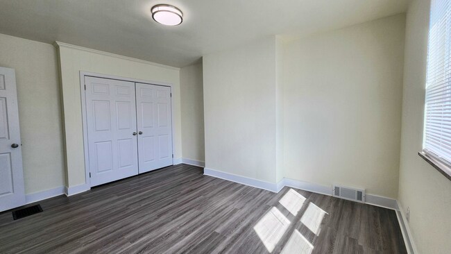 Building Photo - Updated 4BR house with garage!