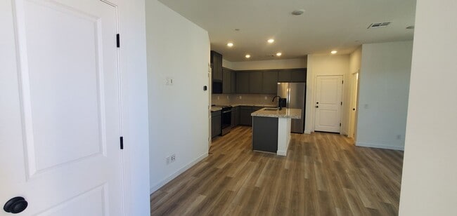 Building Photo - Beautifully designed modern townhome with attached garage.