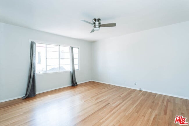 Building Photo - 10961 Strathmore Dr