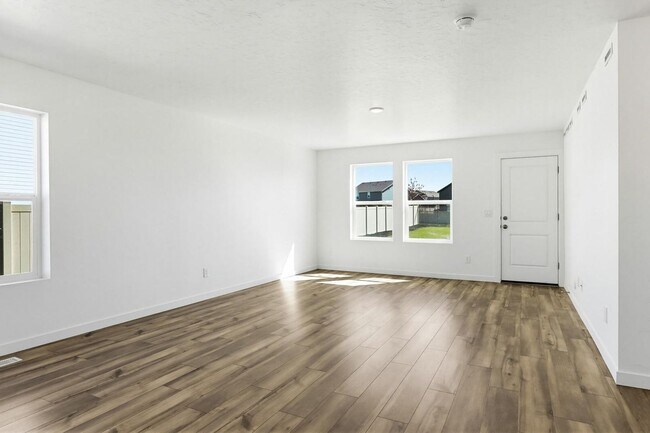 Building Photo - Stunning 4-Bed Home with 3-Car Garage in Cirrus Pointe – Caldwell