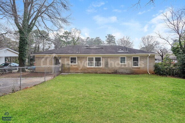 Building Photo - Professionally Renovated Brick Ranch with Designer Kitchen - Ready to Move-In!