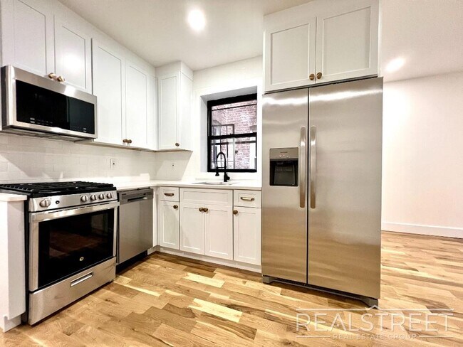 Building Photo - BRAND NEW 4 BED 2 BATH WITH W/D IN UNIT!