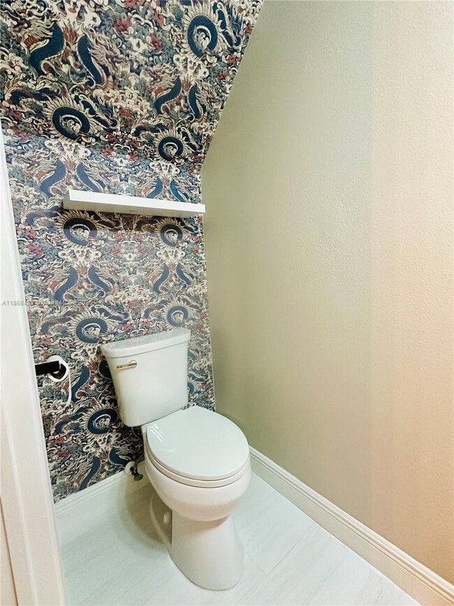 Building Photo - 7821 Sanibel Dr