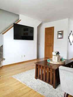 Living room - 1/2 bath entrance - 6303 Colony Cir