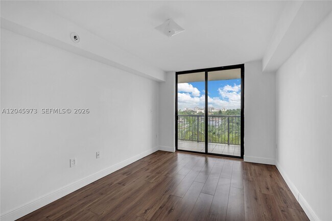 Building Photo - 1690 SW 27th Ave