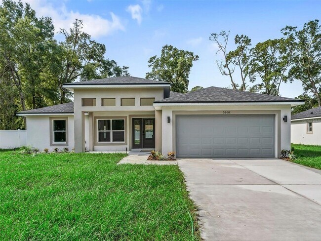 Building Photo - 5386 NW 54th Pl