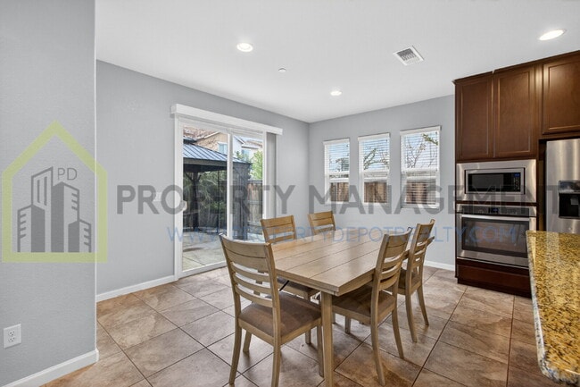 Building Photo - Spacious Elegance Awaits: 4-Bedroom Home with Hardwood Floors in Elk Grove!