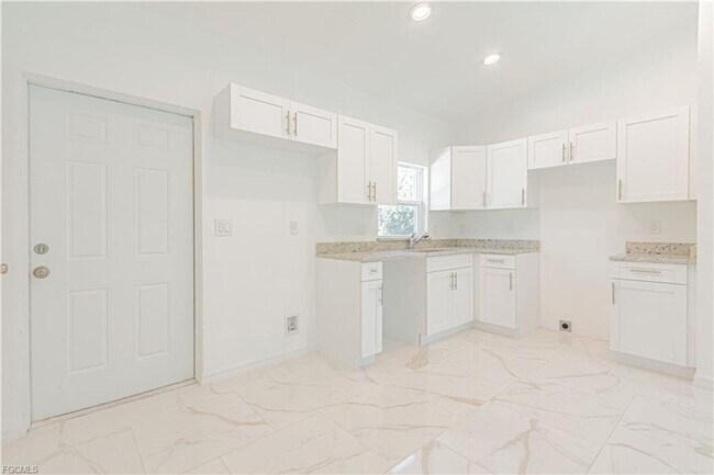 Building Photo - AVAILABLE NOW-TROPIC ACRES-THREE BEDROOM TWO BATH SINGLE FAMILY HOME.