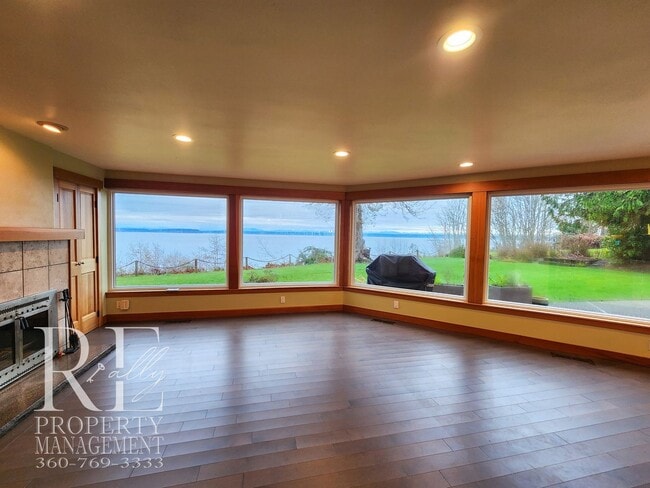 Building Photo - MOVE-IN SPECIAL: 50% OFF FIRST MONTHS RENT - Waterfront Rustic Retreat with Vaulted Ceilings, Pic...