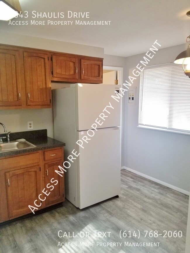 Building Photo - 6843 Shaulis Dr