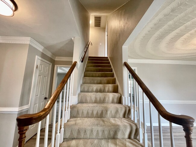 Building Photo - Available NOW! A 4-6 Bedroom Home! Attache...