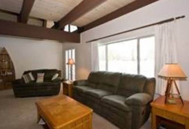 Building Photo - Unique open design,wood beams in all rooms-Very cheery and cozy. Newly remodeled, and newly furni...