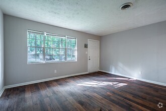 Building Photo - Welcome to this lovely two-bedroom, one-ba...