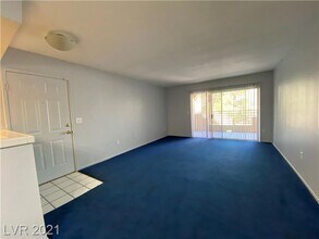 Building Photo - Cozy 1-Bed Condo in Gated 89128 Community ...