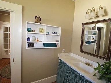 Upstairs bath sink area - 1203 Woodrow St