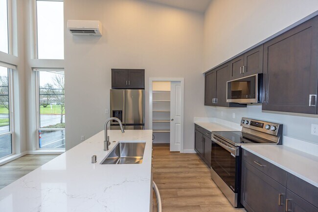 Building Photo - Brand New! - 2 Bedr in Gated Community - Free xfinity Internet