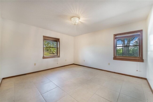 Building Photo - 7740 Lake Hatchineha Rd