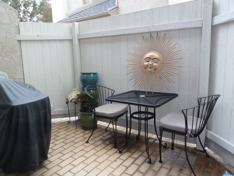 Plantation Shutters open to Patio - 10911 Bluffside Dr