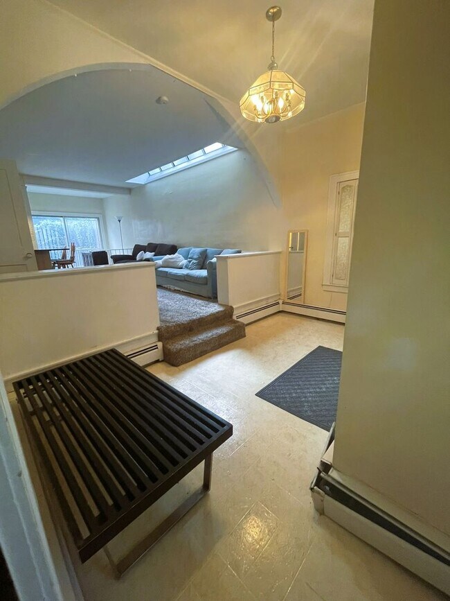 Building Photo - One Block to the Diag! Charming Home with Private Courtyard + Parking