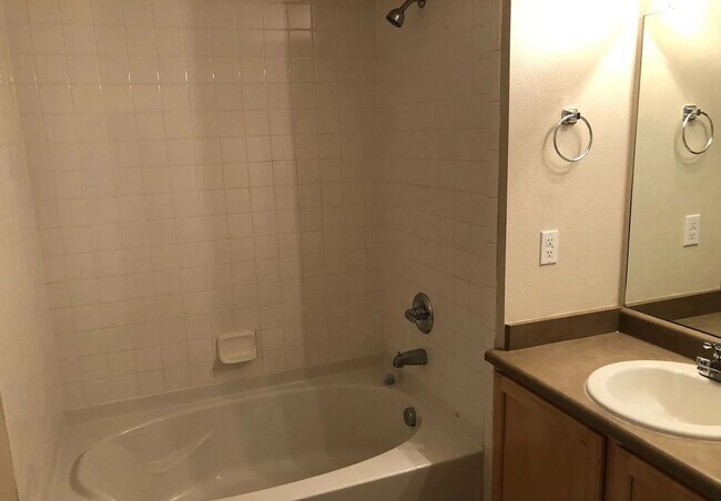 Building Photo - Updated 2 Bed, 2 Bath Main Floor Condo with Garage
