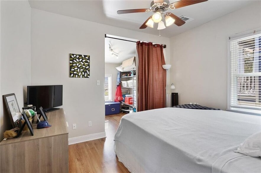 The generous bedroom includes a nook that could be a home office - 213 Polk Street