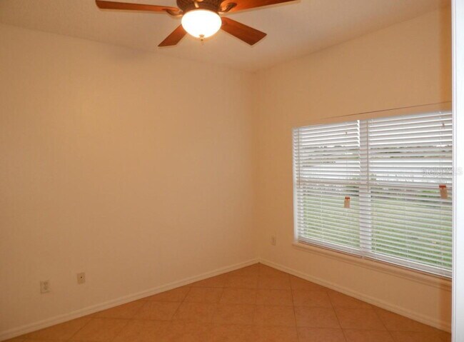 Building Photo - **Charming 4BR/2BA Pond-View Home with Boat Ramp Access – East Orlando **