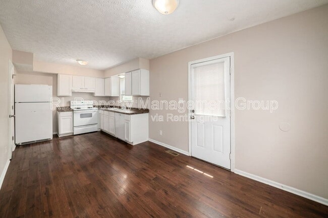 Building Photo - 7179 Feather Ct