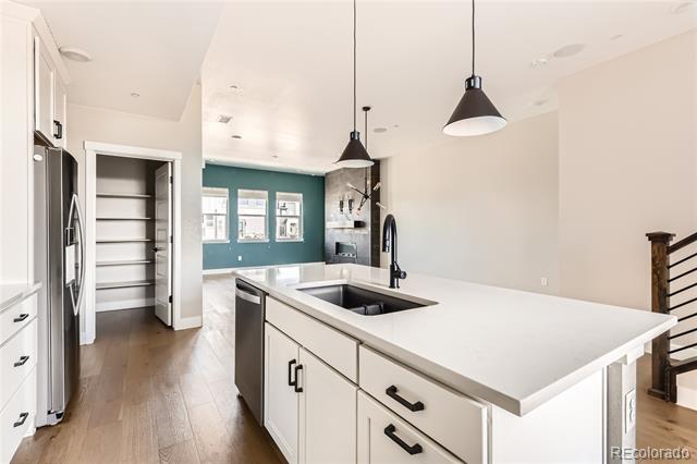 Building Photo - 1565 W 67th Ave